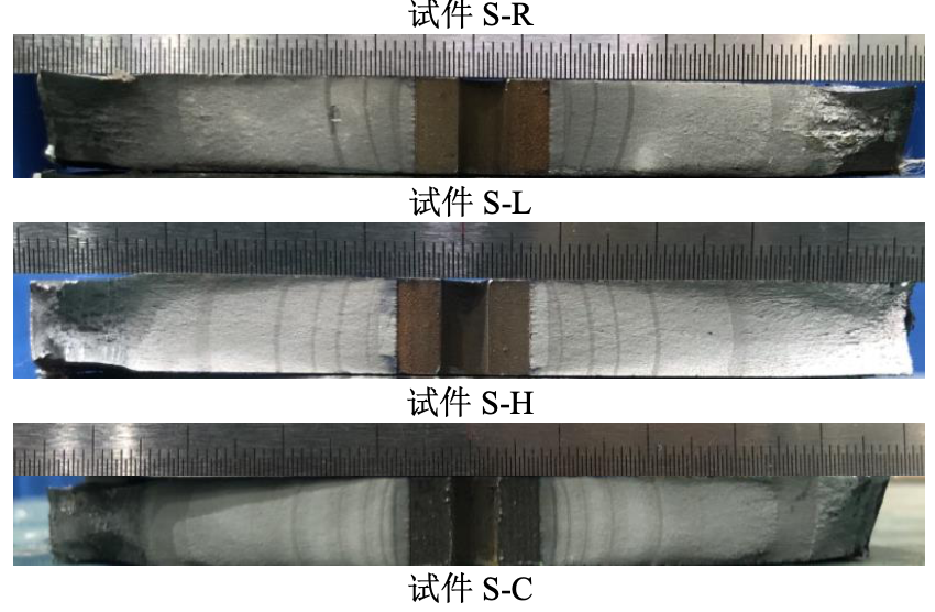 Thermal effects on fatigue behavior of cracked steel plates retrofitted with Fe-SMAs